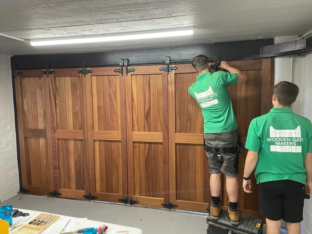 Wooden garage door fitting a door 